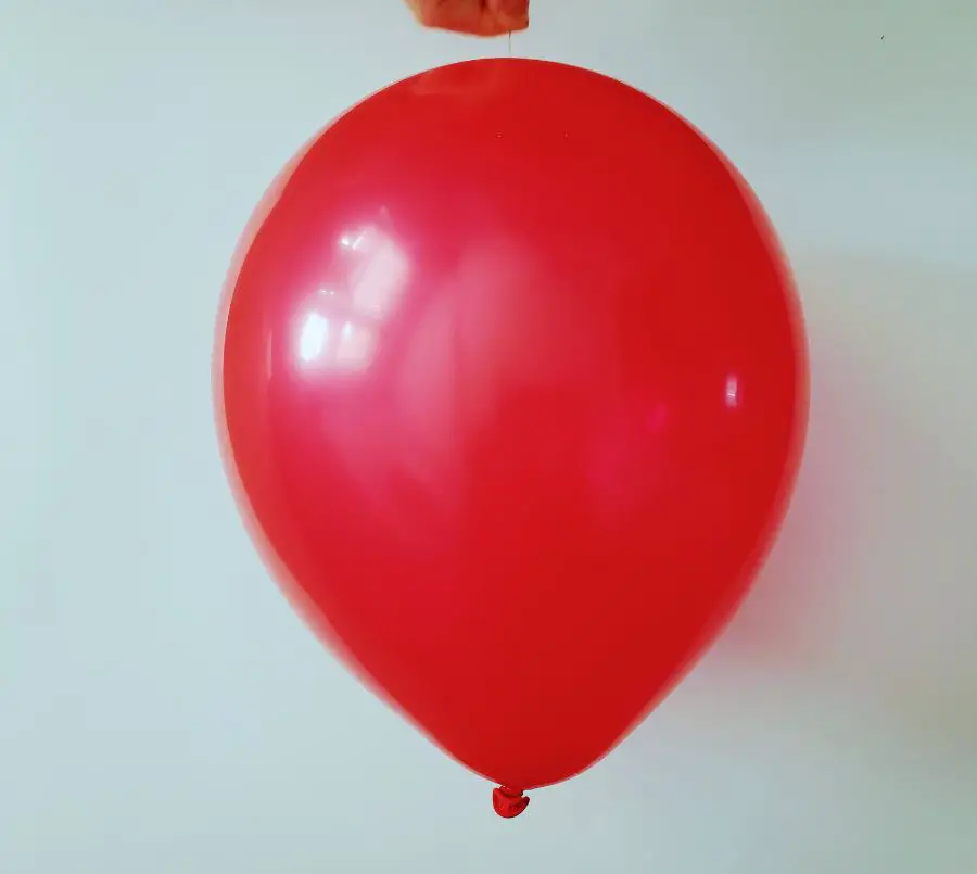 A Pin Popping a Balloon Loudly