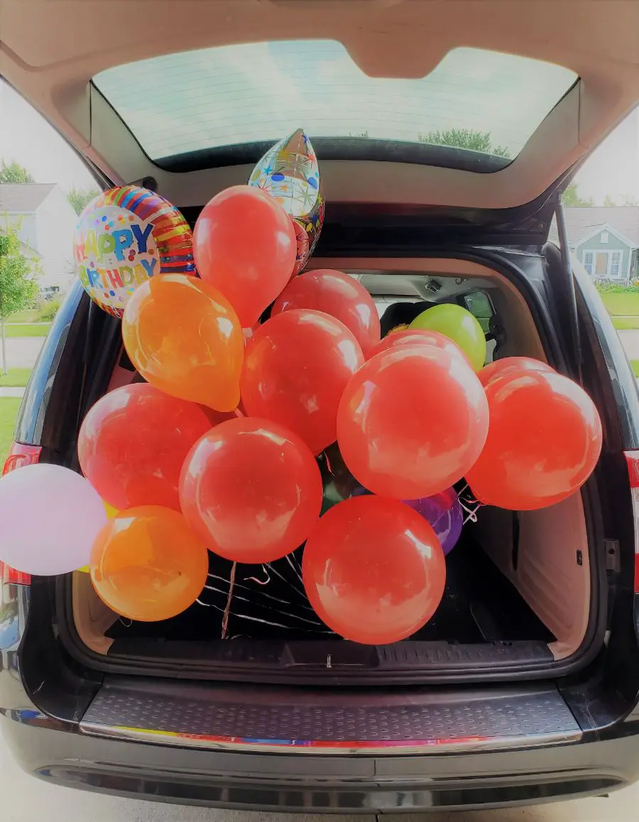 Filling a Car with Helium Balloons