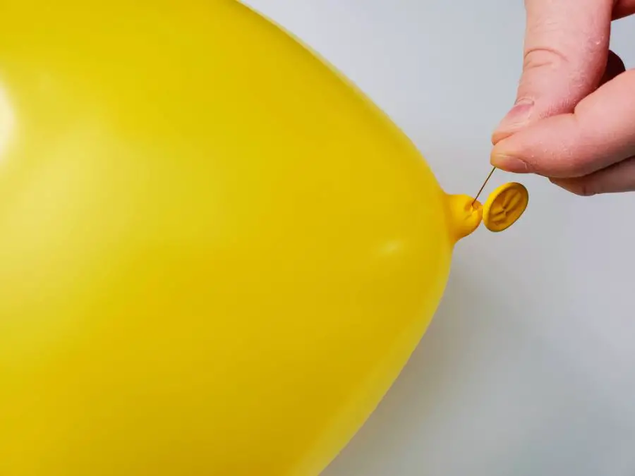 Pierce Balloon with a Sharp Pin