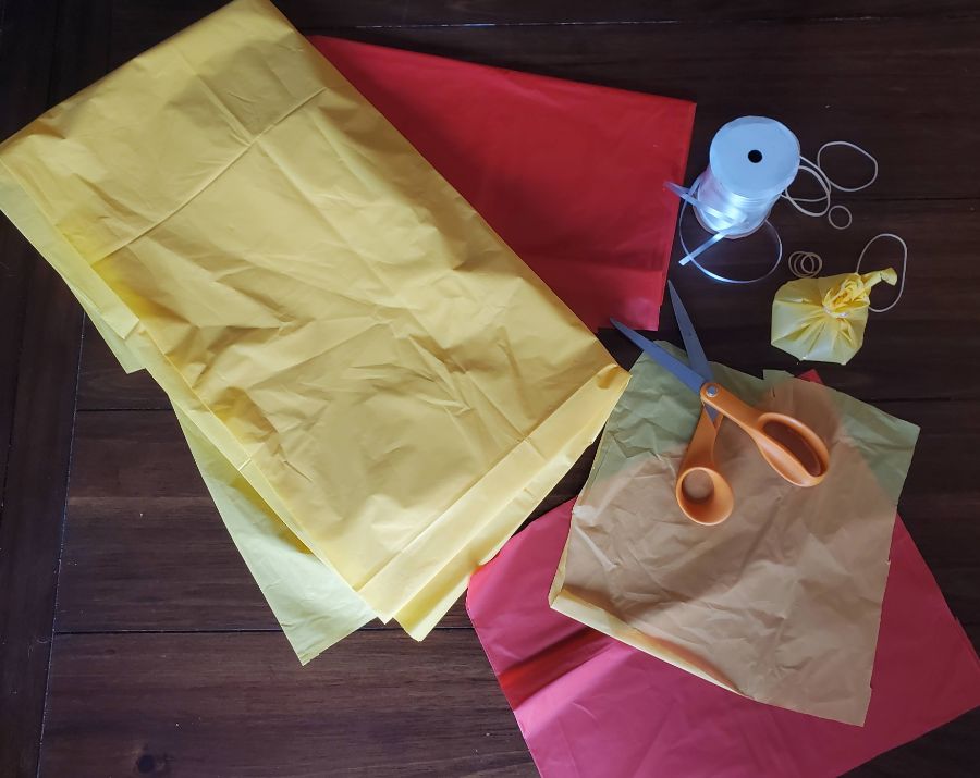 Supplies for Making Water Balloons with Plastic Table Covers