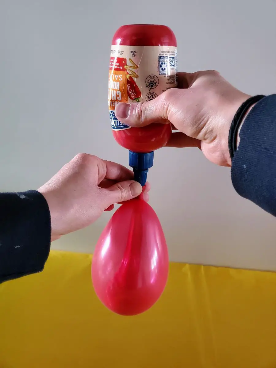 Filling a Balloon with Paint Using a Recyled Condiment Bottle