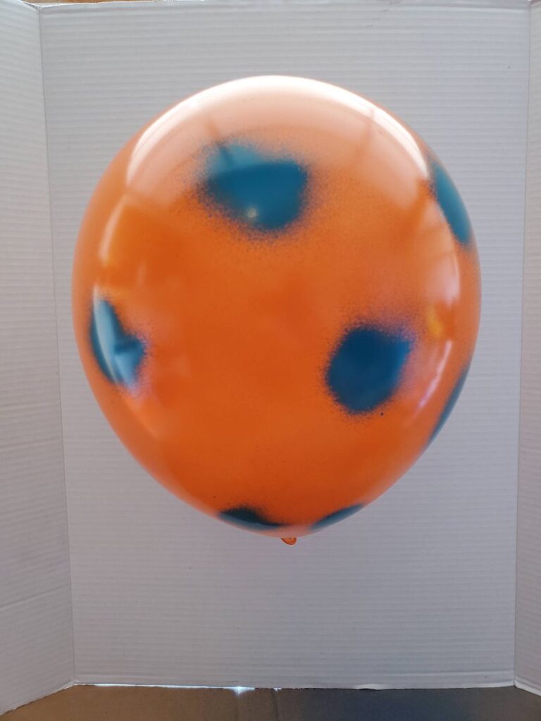 Balloon Fully Covered in Spray Paint